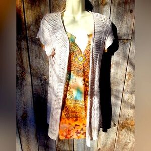 Cute short sleeve cardigan by Maurice’s. Size L